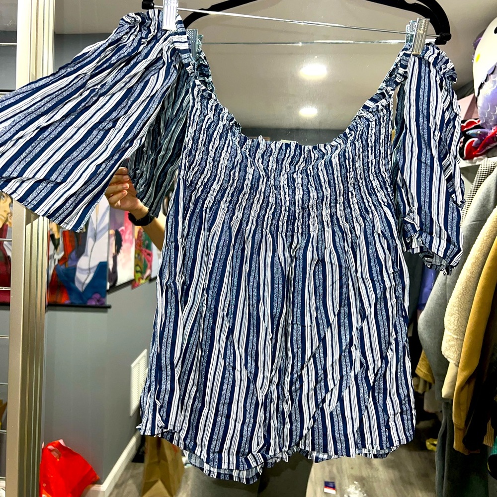 Woman’s Over-the-Shoulder Striped Blouse